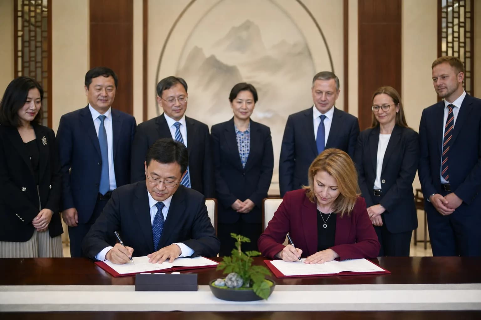 Illustrative photo: an agreement signing during an international delegation visit